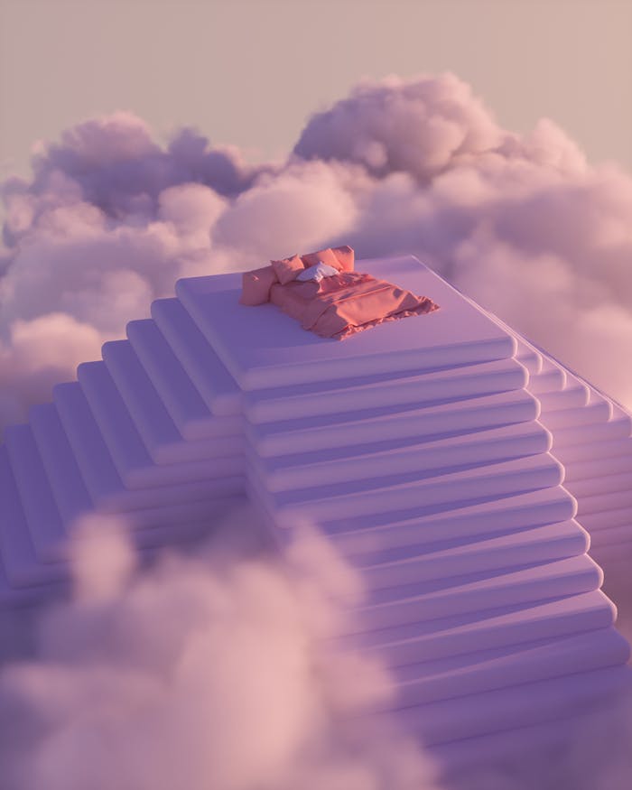 our-services-1 A dreamlike scene with a bed atop stairs surrounded by pink clouds, evokes serenity.